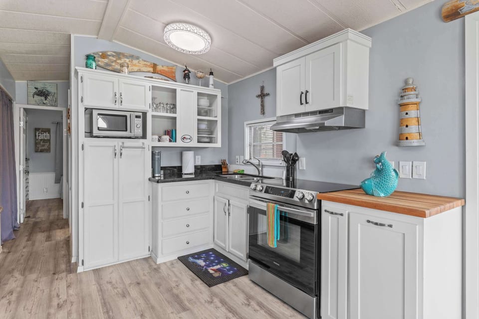 Plenty of counter space and cabinets for your stay