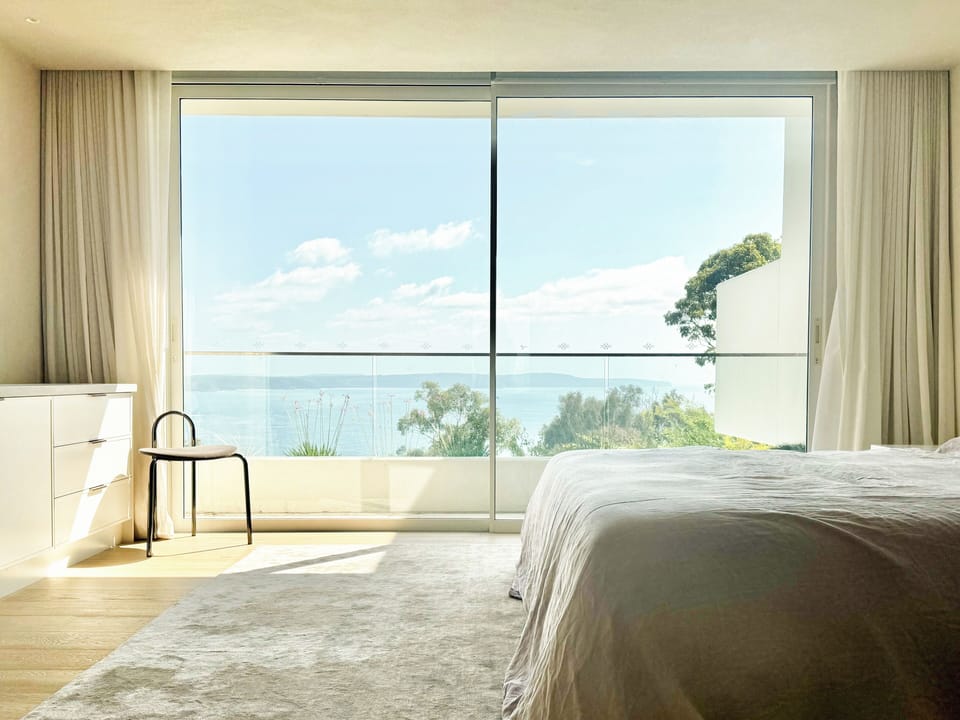 Primary bedroom 2 with ensuite overlooking the ocean. 