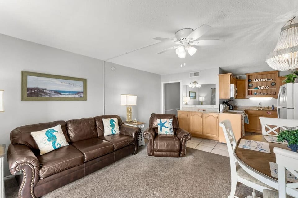 Spacious living room with Queen size fold out sofa and dining area