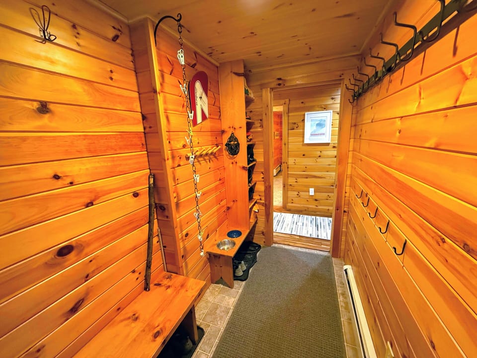 Enter through the mudroom, which offering plenty of space to store your gear.