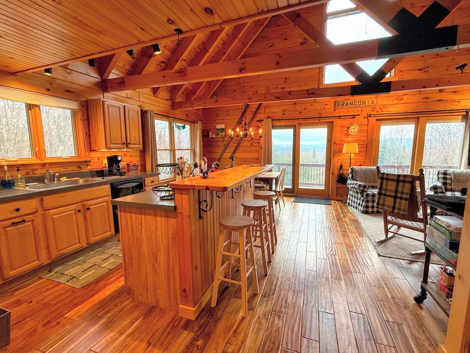 The bright open-concept kitchen offers plenty of natural sunlight.