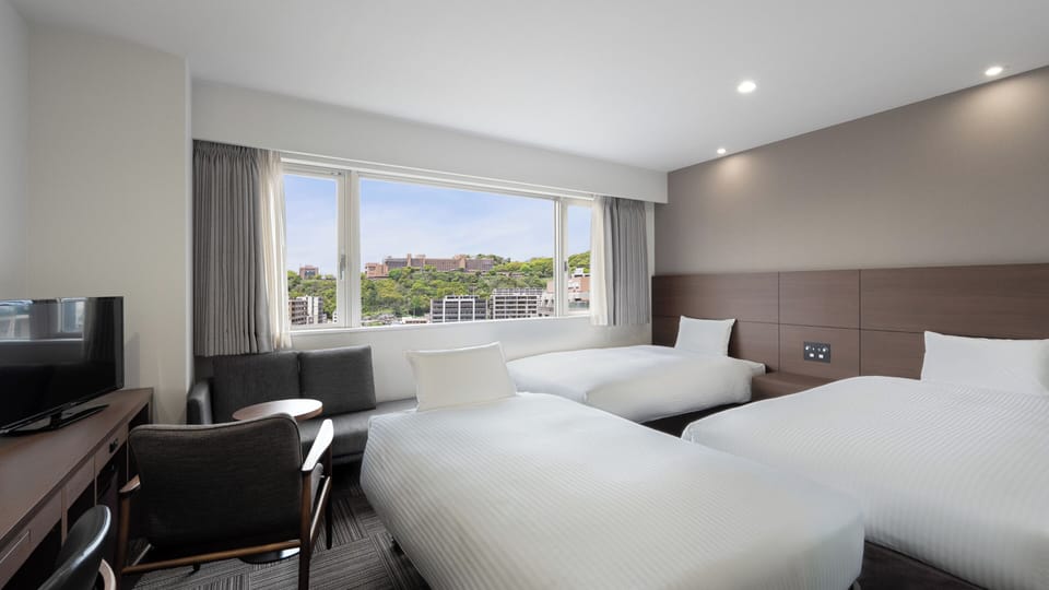 Superior Twin Room, Non Smoking | In-room safe, laptop workspace, blackout drapes