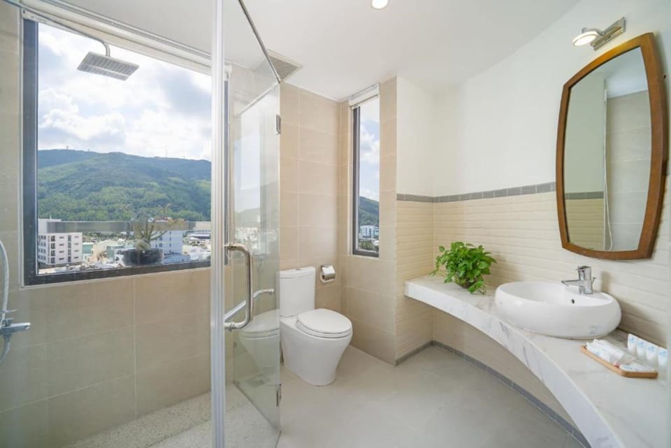 Family Room, City View | Bathroom | Shower, free toiletries, hair dryer, slippers