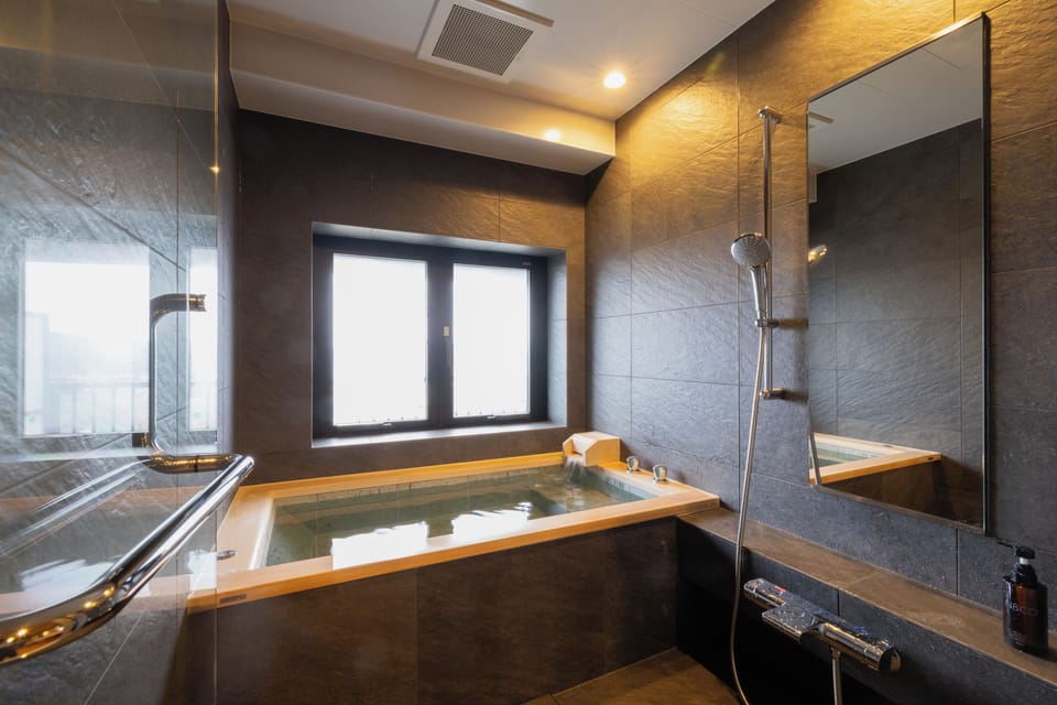 Luxury Suite, City View | Bathroom | Free toiletries, hair dryer, bidet, towels