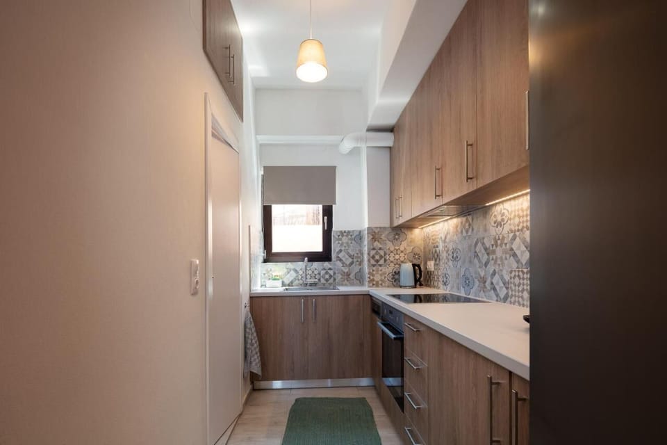 Comfort Apartment, Balcony, Sea View | Private kitchen | Electric kettle, highchair