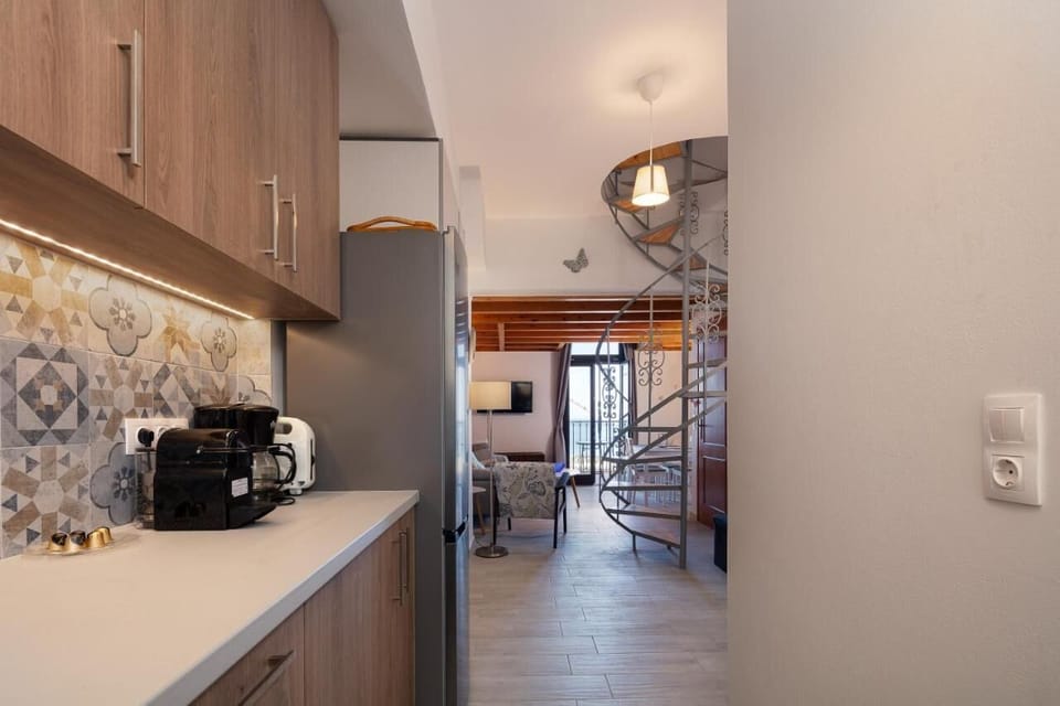 Comfort Apartment, Balcony, Sea View | Private kitchen | Electric kettle, highchair