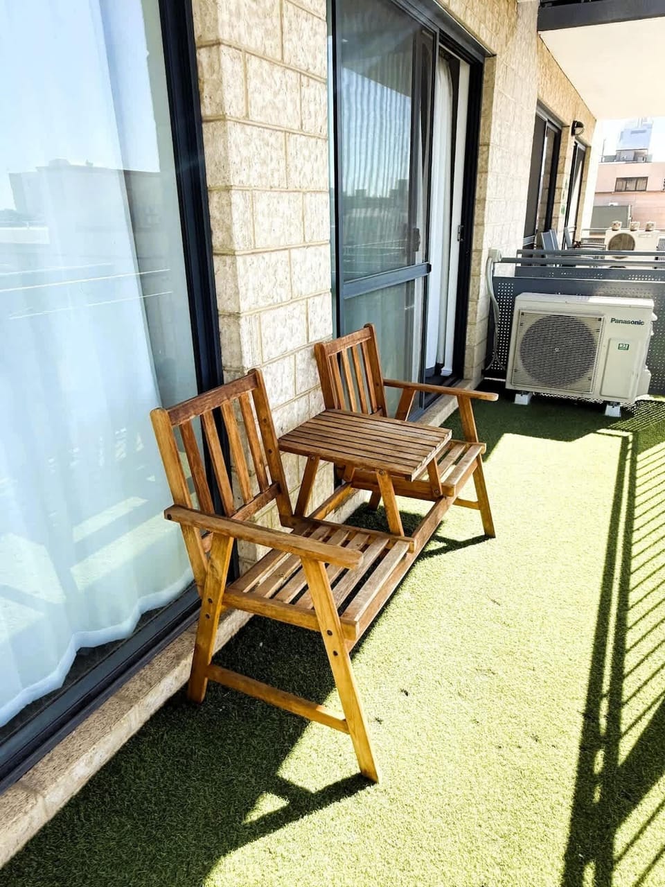 Enjoy your morning coffee or evening wine on this sunny private balcony.