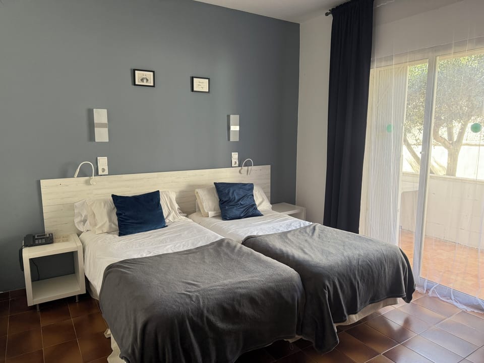 Standard Double Room, Balcony, Garden View | Down comforters, in-room safe, desk, laptop workspace