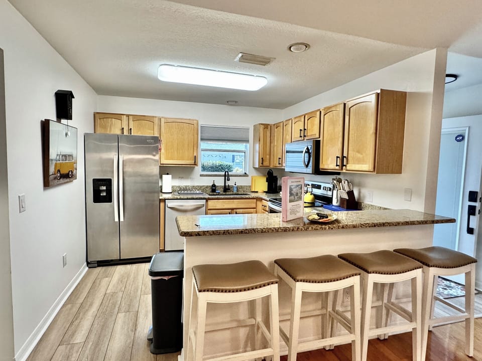 Kitchen with Essentials and Breakfast Bar/Stools