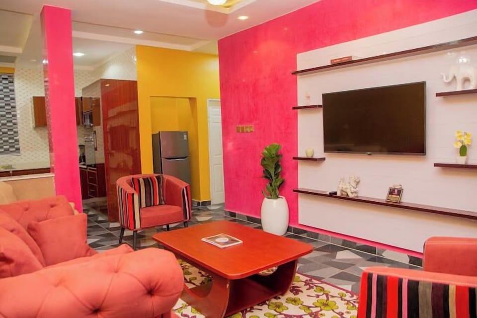 Deluxe Apartment, Balcony, City View | Living area | Flat-screen TV