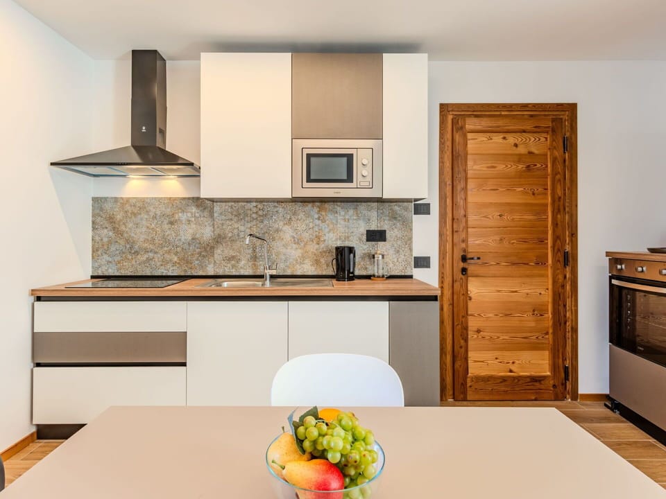 Furniture, Interior Design, Flooring, Wood, Floor, Room, Ceiling, Cabinetry, Lighting, Home