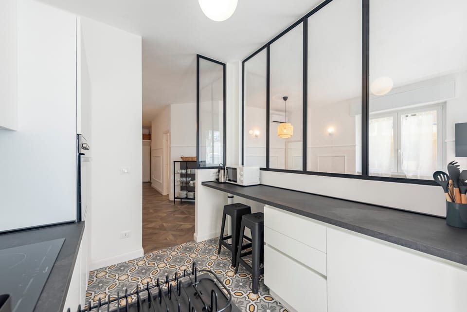 Apartment, 3 Bedrooms, Balcony, Partial Sea View | Private kitchen | Dishwasher, coffee/tea maker, dining tables