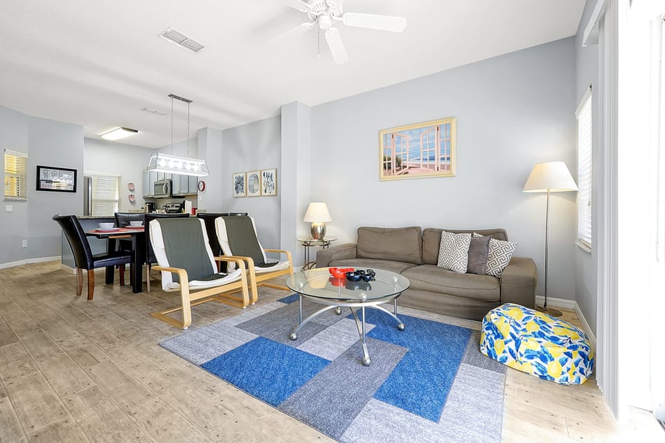 Kick back and relax in our comfy living room. With modern coastal decor and a smart TV, it's the perfect spot to unwind and plan your next day of fun. Plenty of natural light!