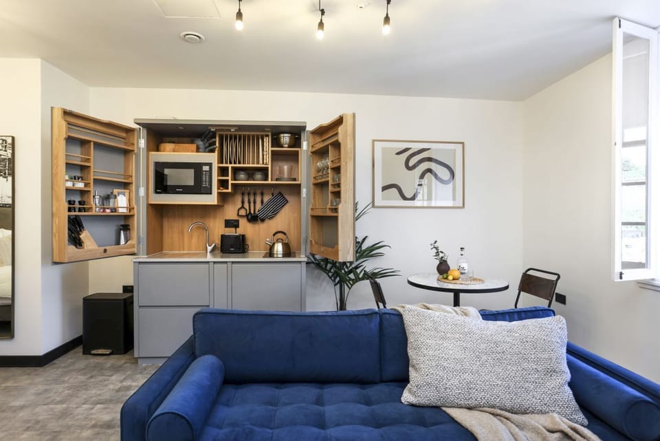 Studio with bed and kitchen