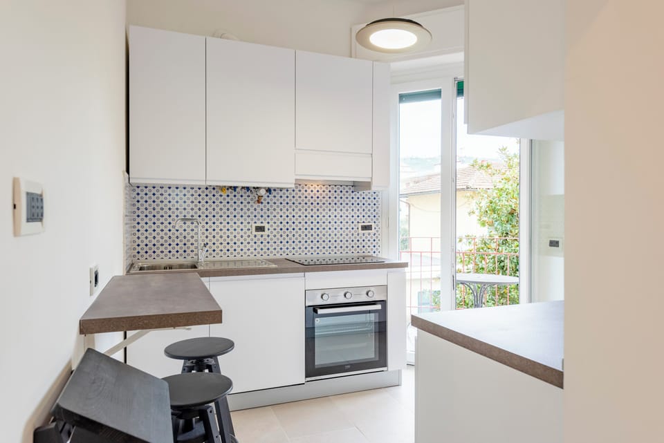 Apartment, 2 Bedrooms, Balcony | Private kitchen | Espresso maker, dining tables