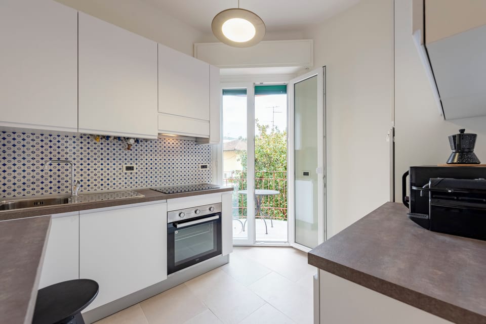 Apartment, 2 Bedrooms, Balcony | Private kitchen | Espresso maker, dining tables