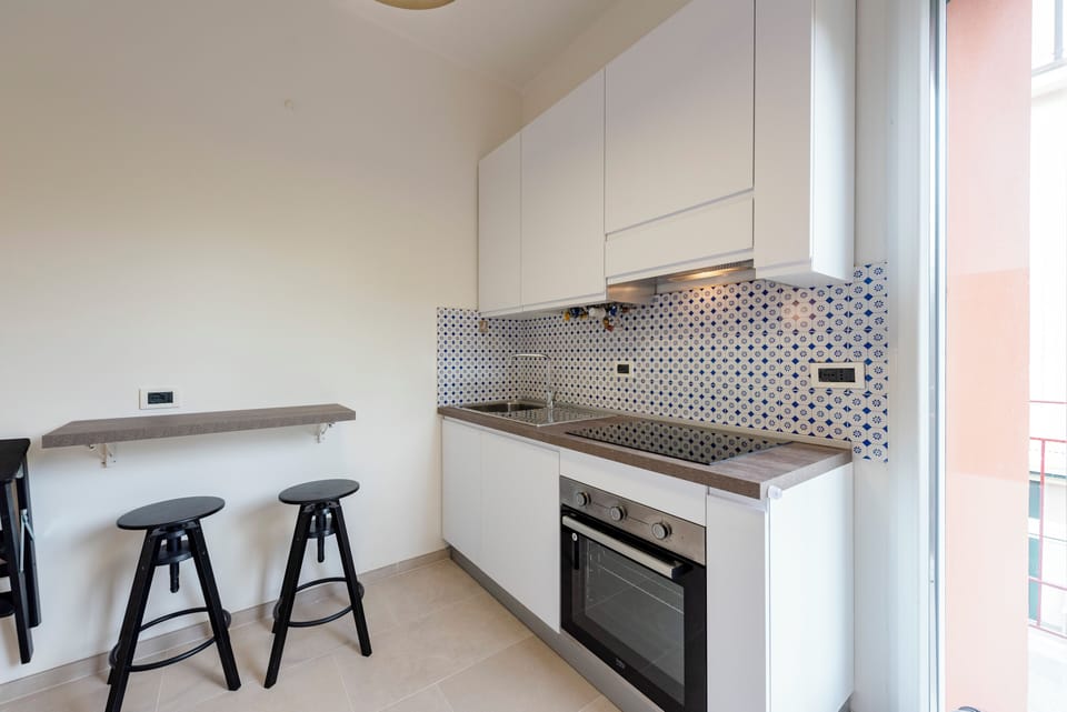 Apartment, 2 Bedrooms, Balcony | Private kitchen | Espresso maker, dining tables