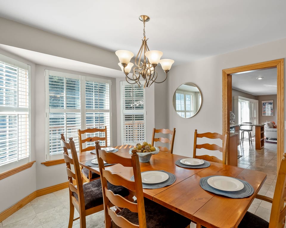 Enjoy shared meals just steps from the living room for easy flow.