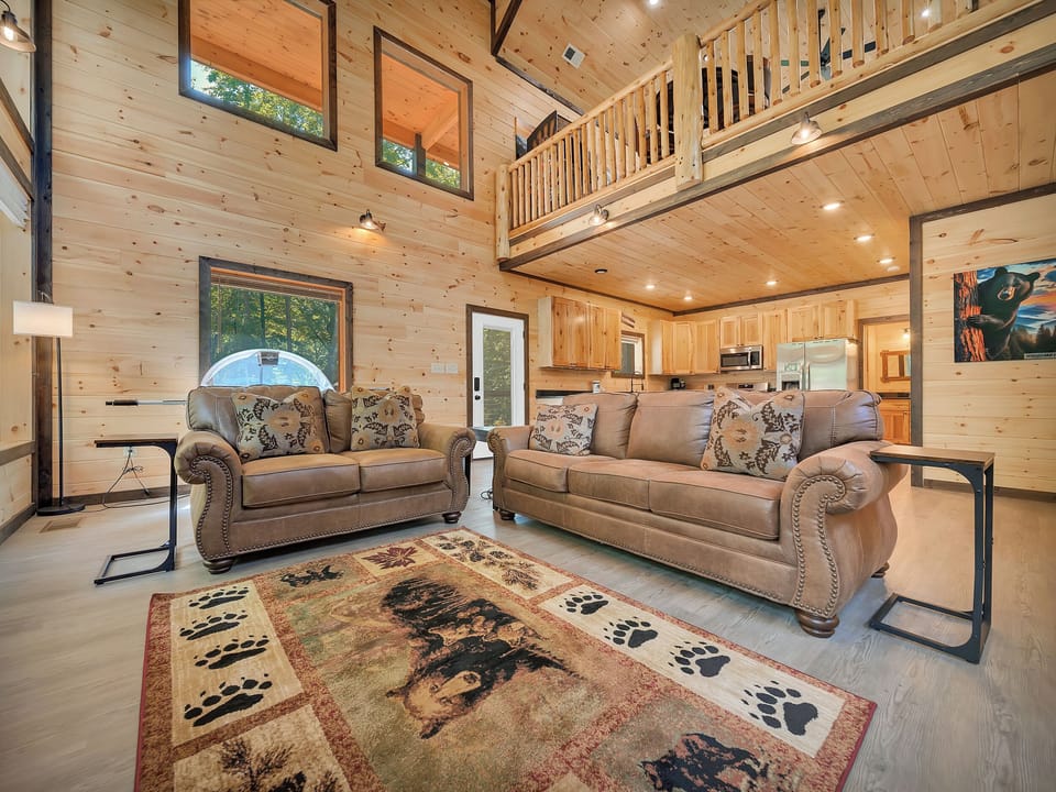 Cozy up by the fireplace in the spacious living area
for a night of movies and games, or just a good book.
