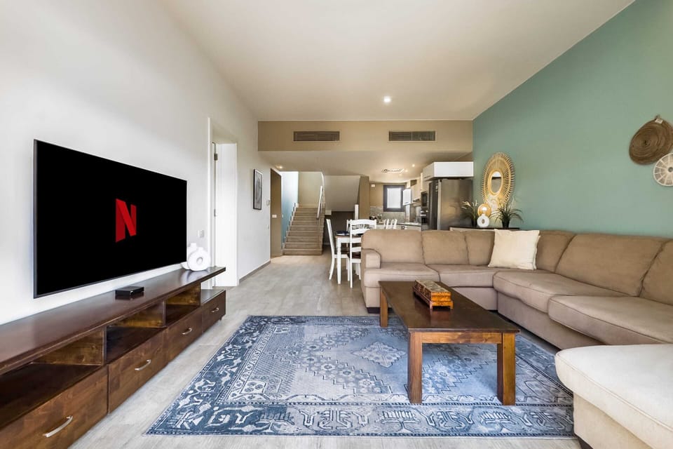 Basic Villa | Living area | 55-inch Smart TV with cable channels