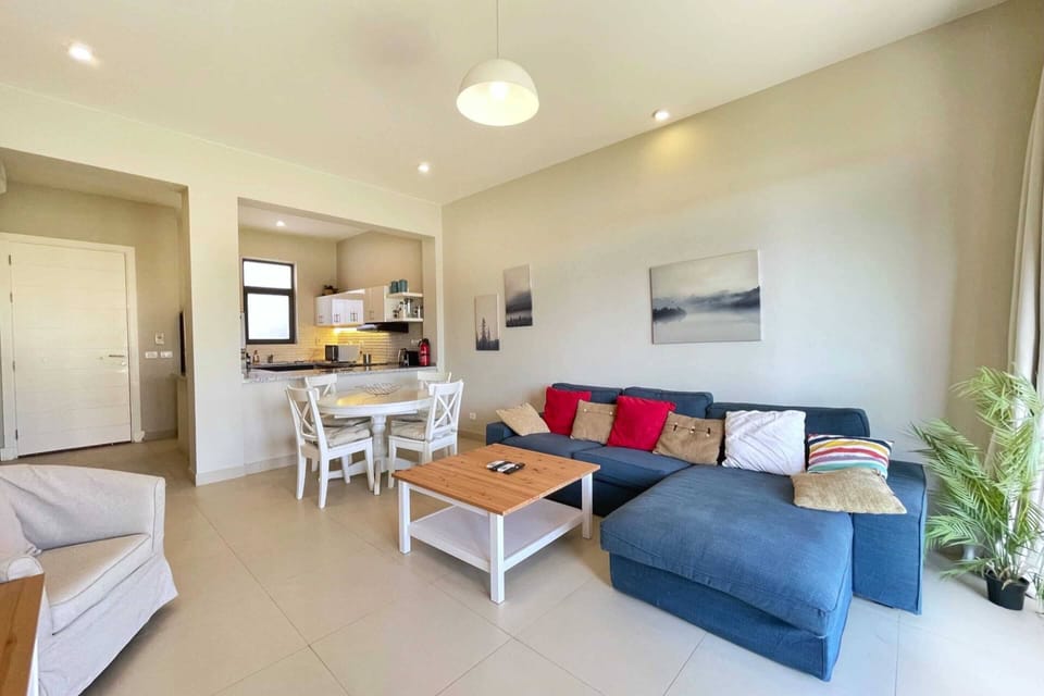 Basic Villa | Living area | 55-inch Smart TV with cable channels