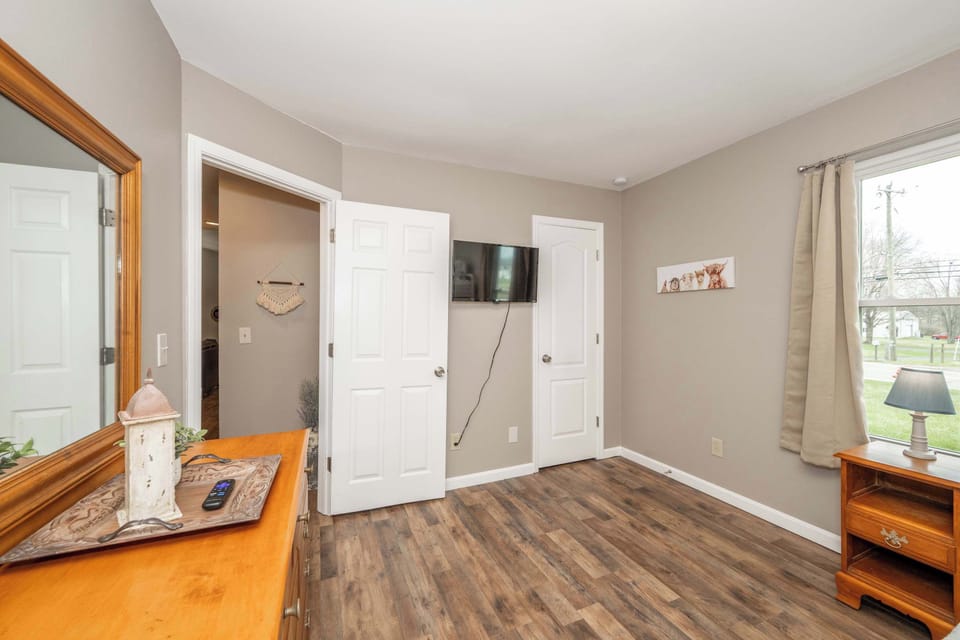The second bedroom includes a twin-over-full bunkbed & smart TV