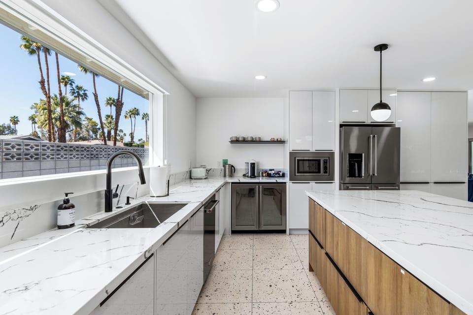 Chef's kitchen with a huge island for three