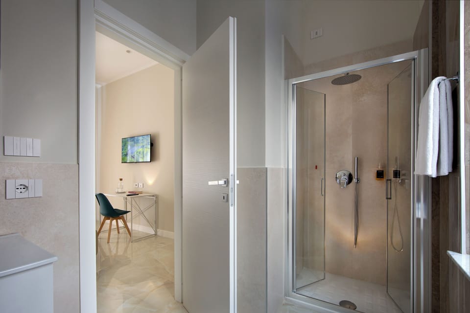 Superior Double or Twin Room | Bathroom | Shower, hair dryer, bidet, towels