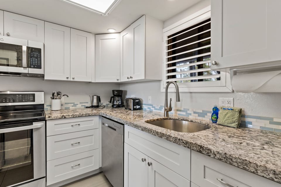Condo, 2 Bedrooms | Private kitchen | Coffee/tea maker, fridge, oven, toaster