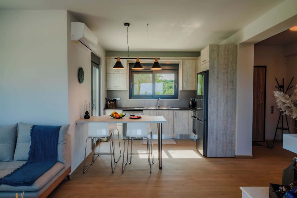 This functional and inviting kitchen makes meal prep feel like part of the holiday, with plenty of natural light and garden access just steps away.