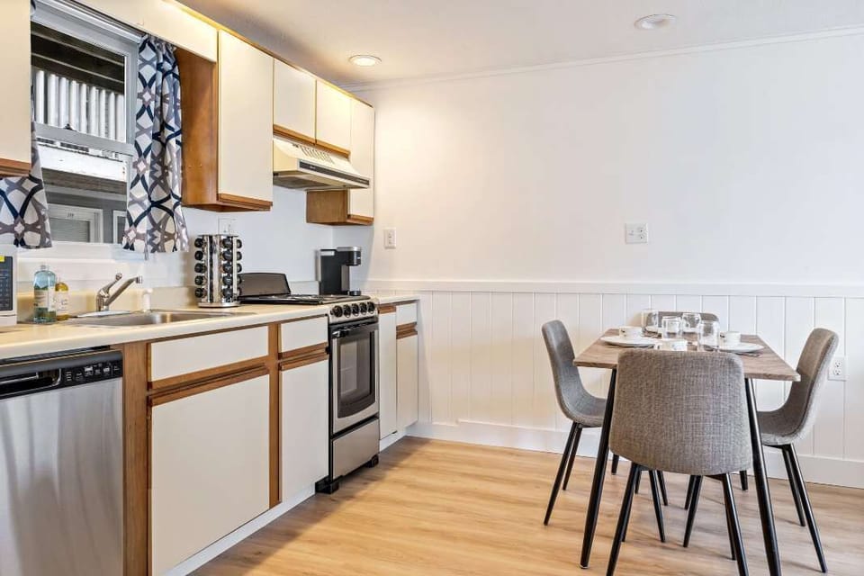 The open kitchen offers ample space & every home comfort