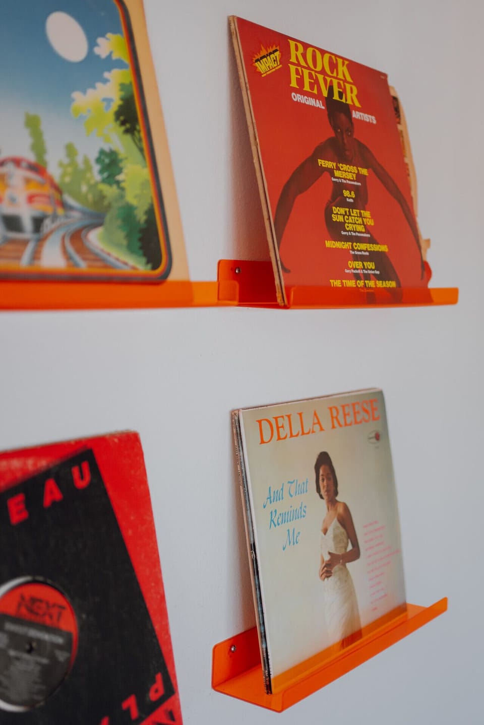 Unwind in a cozy, music-filled living space with a working record player to set the perfect mood.