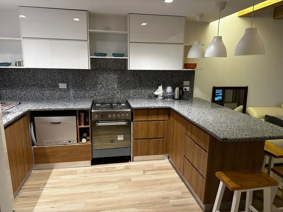 Chalet, Air conditioning, Pool View | Private kitchen | Microwave