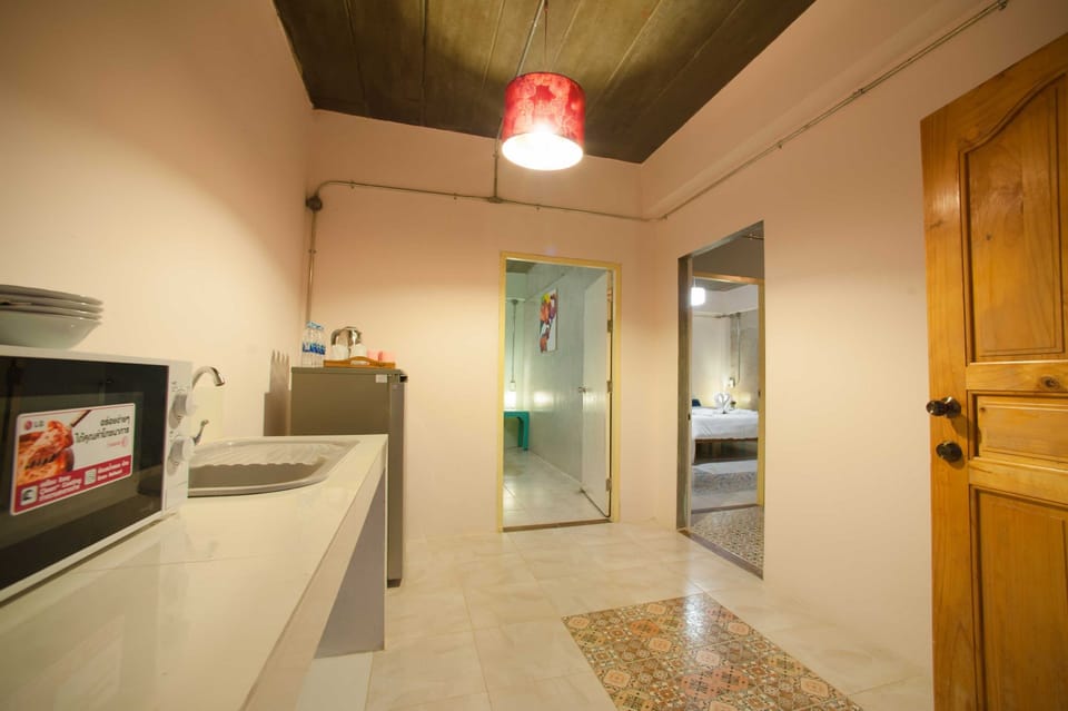 Family Room - 4 Adults | Private kitchen | Fridge