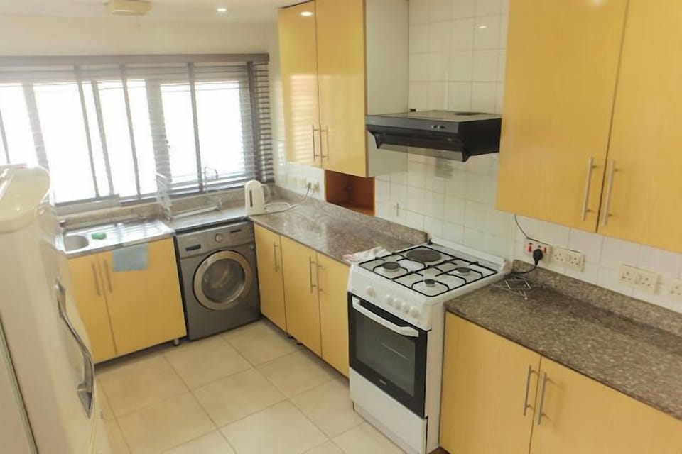 Classic Apartment, Balcony, City View | Private kitchen | Fridge, microwave, oven, stovetop