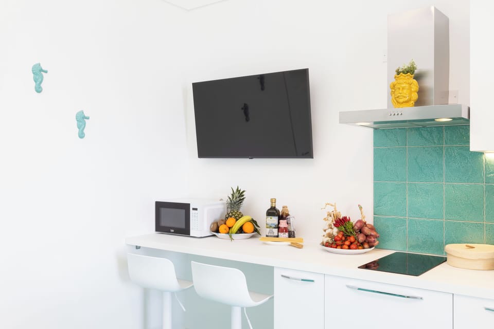 Apartment, Sea View | Private kitchen | Espresso maker, coffee/tea maker, electric kettle