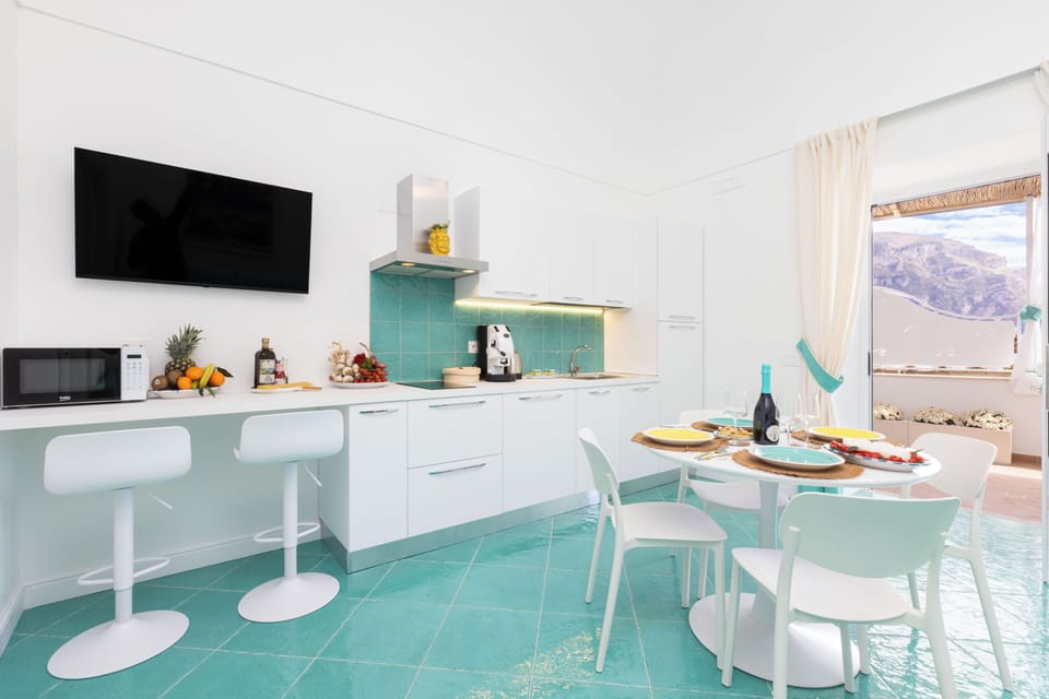 Apartment, Sea View | Private kitchen | Espresso maker, coffee/tea maker, electric kettle