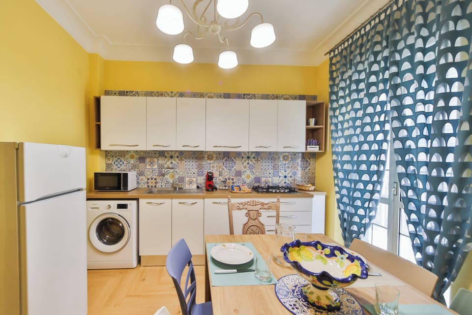 Deluxe Apartment, Balcony | Private kitchen | Full-size fridge, microwave, oven, stovetop