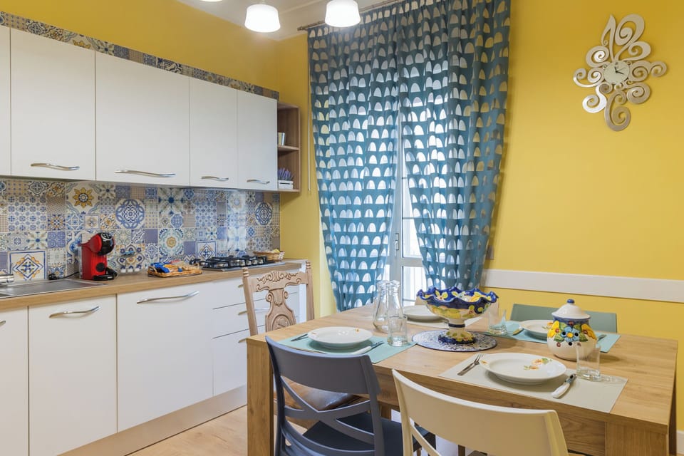 Deluxe Apartment, Balcony | Private kitchen | Full-size fridge, microwave, oven, stovetop
