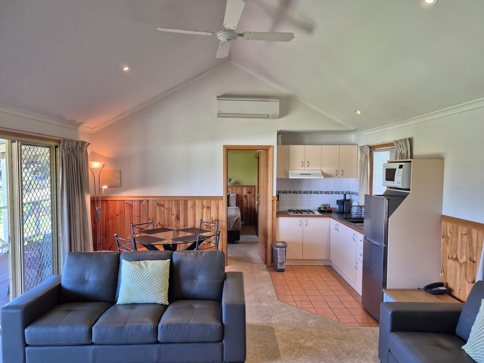 2 Bedrooms, 2 Bathrooms Self Contained Spa Cottage | Living area | 55-inch Smart TV with digital channels, TV