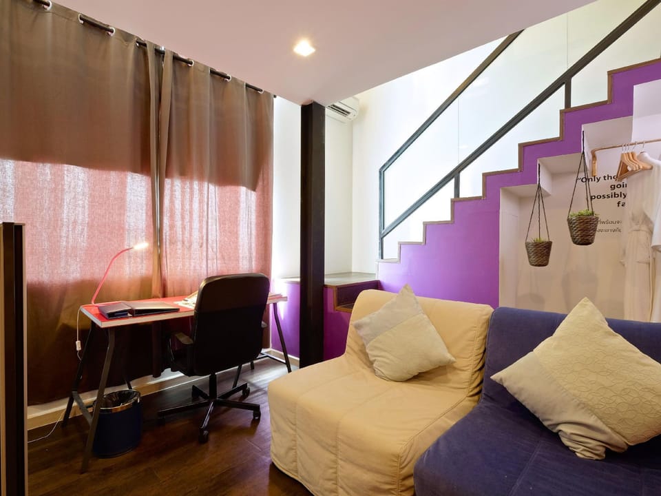 Family Duplex | Living area | 32-inch flat-screen TV with cable channels, TV