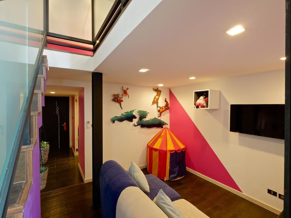 Family Duplex | Living area | 32-inch flat-screen TV with cable channels, TV