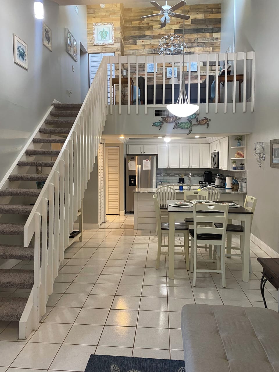 View from front door. Living, dining room and kitchen.