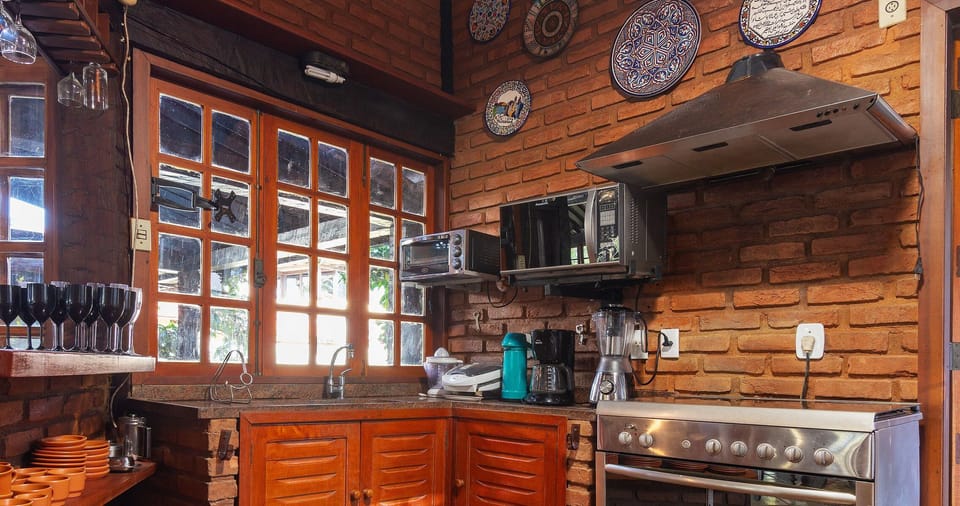 Villa | Private kitchen | Fridge, microwave, oven, stovetop