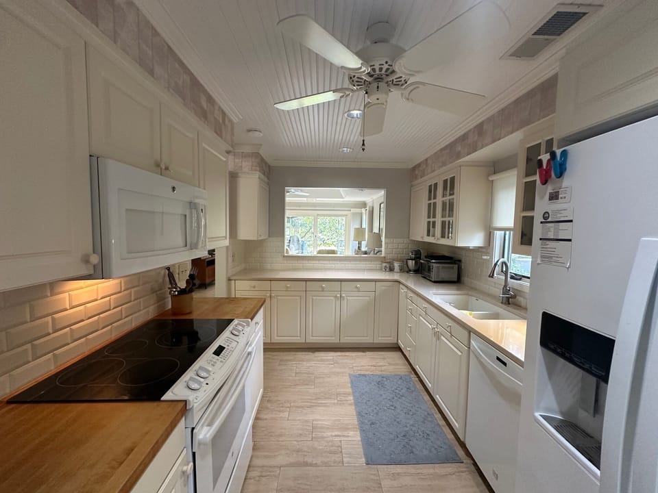 Kitchen has a pass through to dining for easy serving.