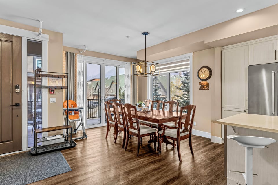 Open concept with access to front balcony and BBQ.