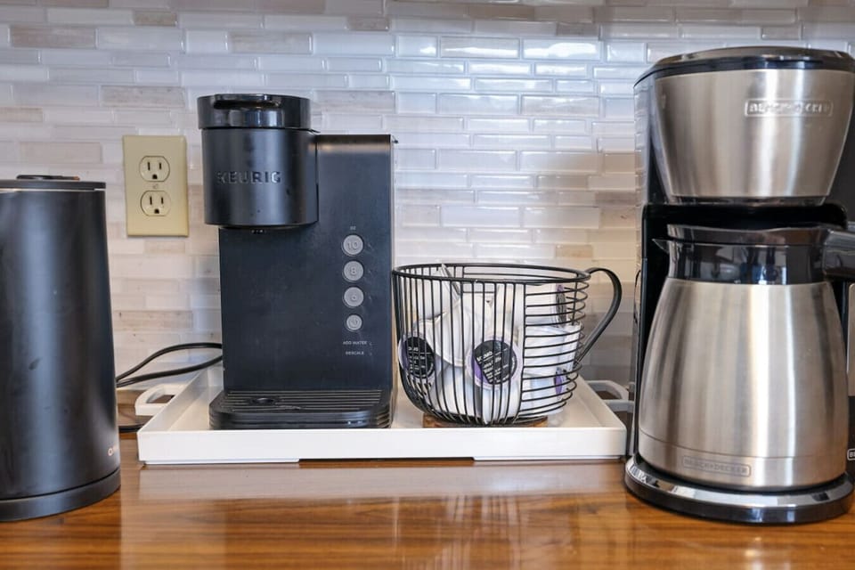 Start your day right at our cozy coffee corner—complete with Keurig, kettle, and all your morning essentials!