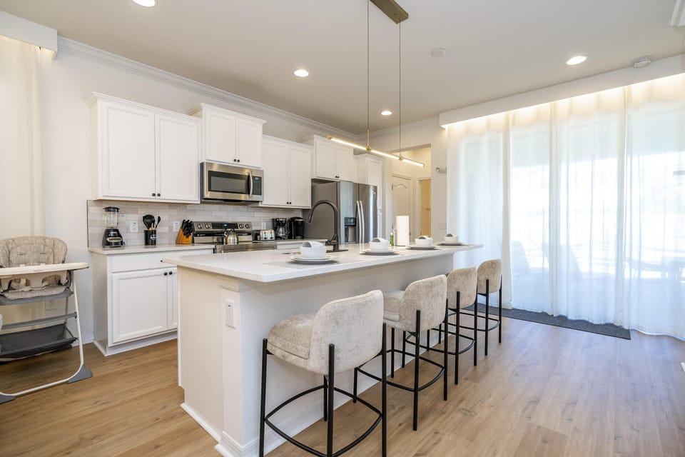 Bright, modern kitchen with spacious island and natural light