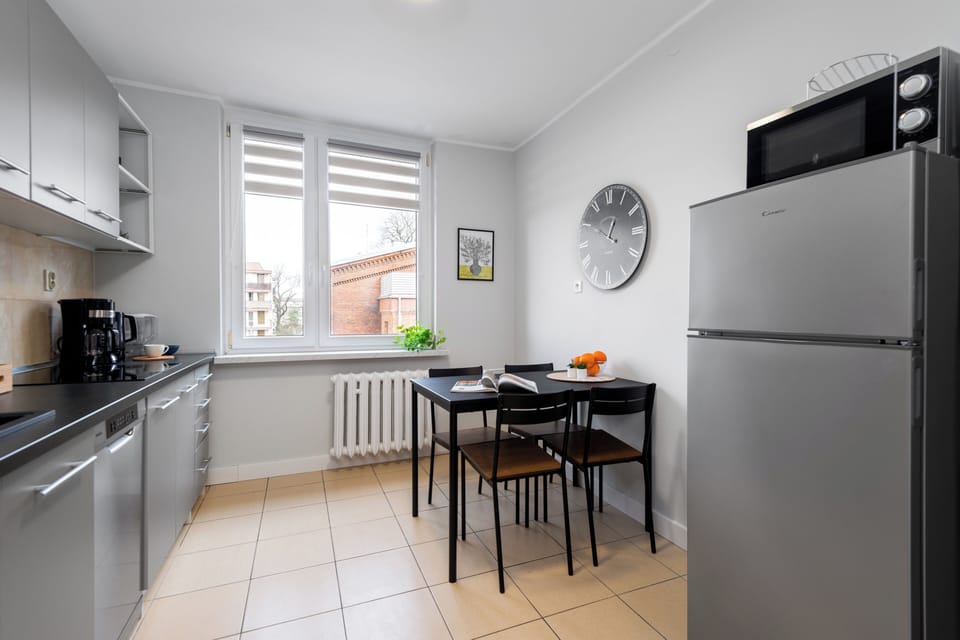 Family Apartment, City View | Private kitchen | Full-size fridge, microwave, stovetop, dishwasher