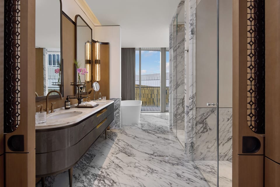 Separate tub and shower, hair dryer, bathrobes, slippers